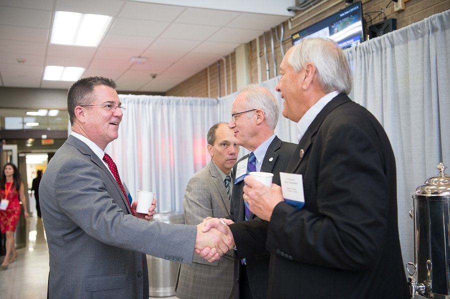 politicans greet each other