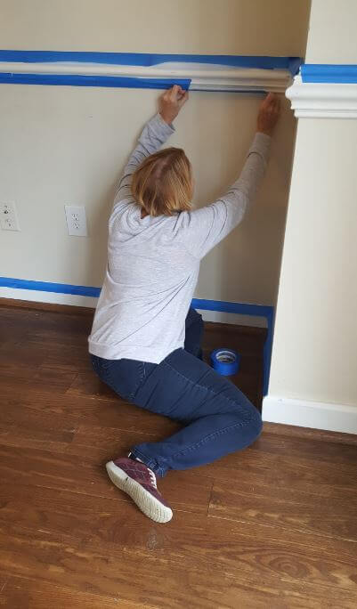 A realtor doing a voluntary house painting